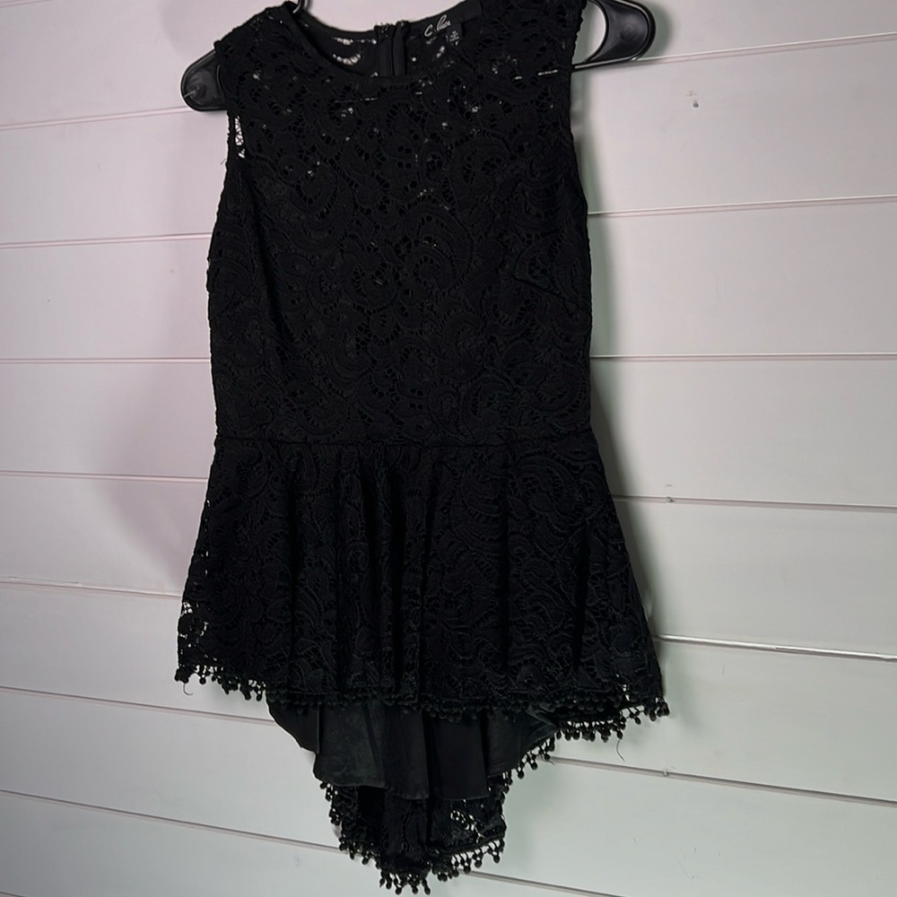 Med lace top longer in the back black lace top.  A408